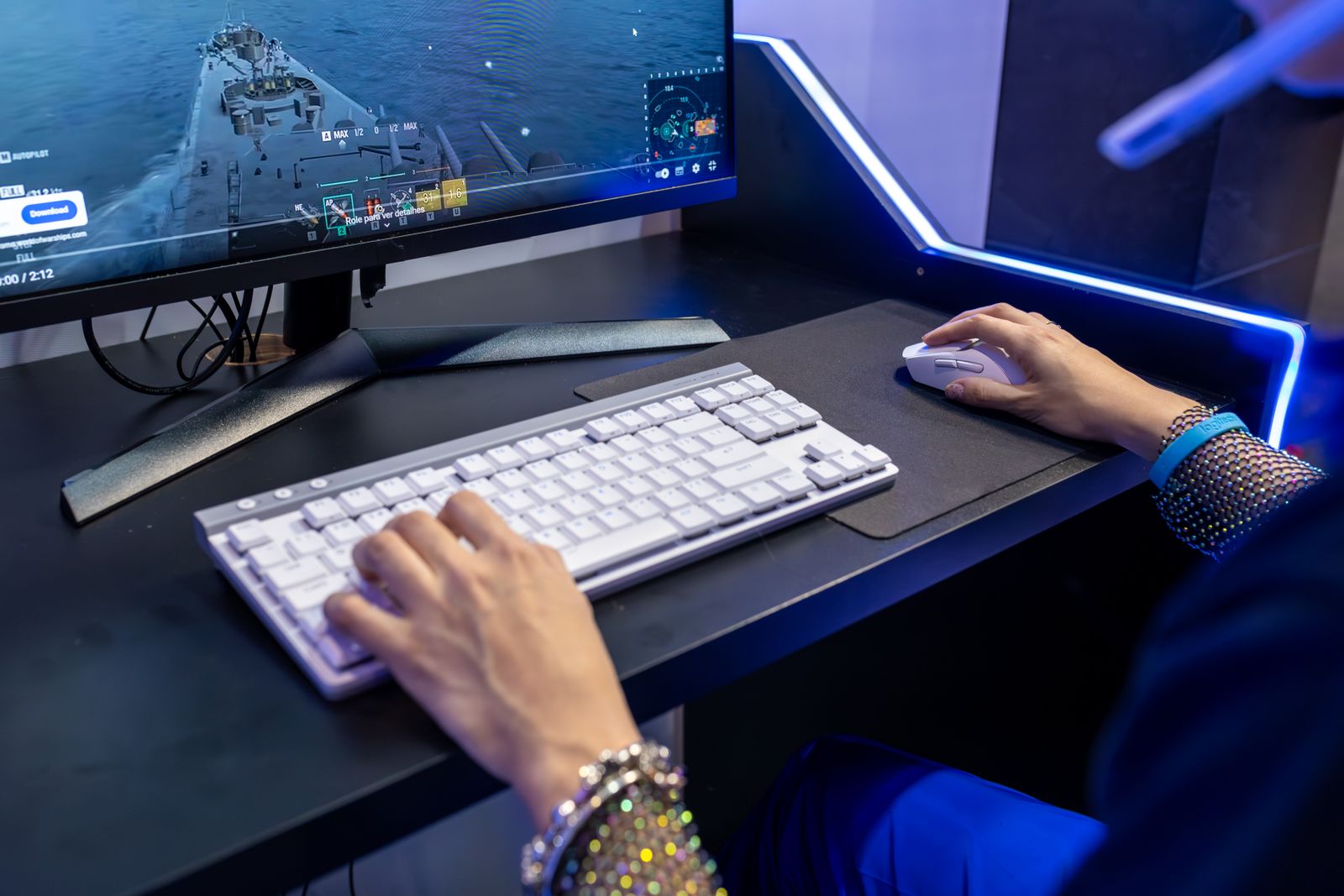 Multicolour gamer setup with curved monitor